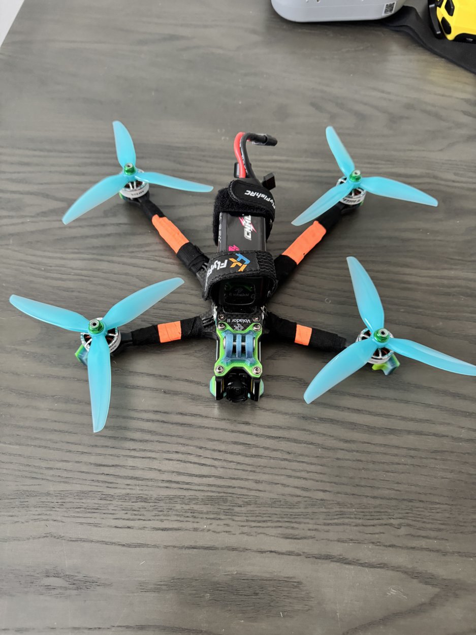 Actual front view. In this original photo the camera points toward the bottom; the props-in poster rotates the nose to the top.